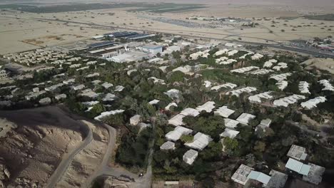 aerial: top view of the small village of yotvata in the middle of the desert, israel