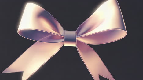 a shimmering rose gold ribbon bow