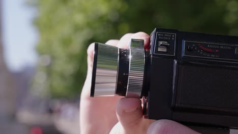 cinematic shot of traveller using camera in london