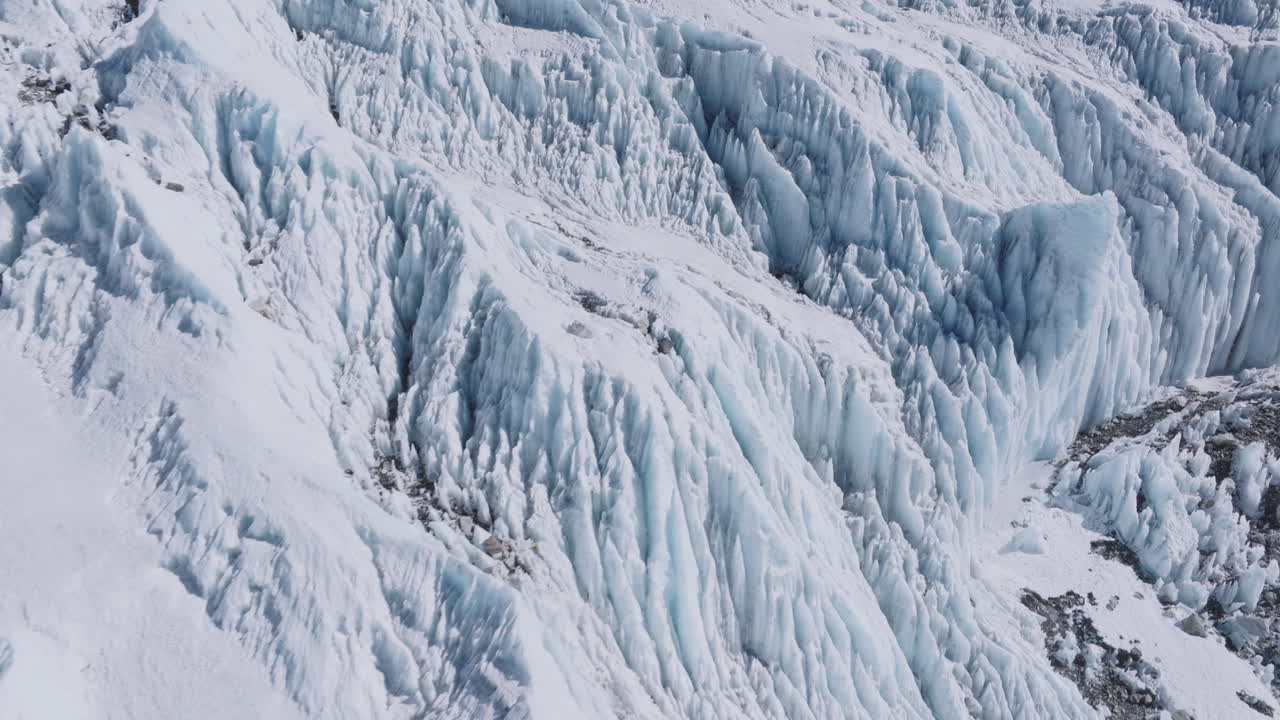 Aerial view of Everest Base Camp glaciers at climbing trails, and snow peaks in the Nepal Himalaya during the climbing season for Tourists adventurous travel experience on snow layers Himalaya