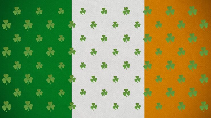Digital animation of multiple clover leaves moving against irish flag