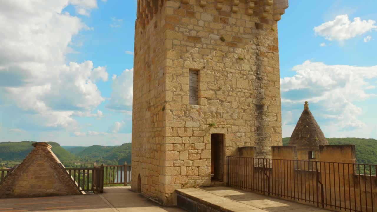 Chateau de Beynac Tower Against Blue Sky In Beynac, France. - tilt up shot