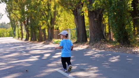 summer outside having fun. funny small boy outdoor spend time.