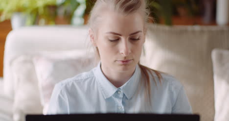 Woman Working On Computer Thinking And Solving Problem 2
