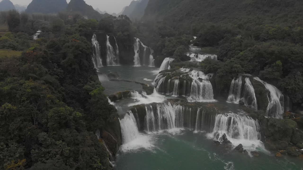 Side panning shot of ban gioc waterfall at Cao bang Vietnam, aerial