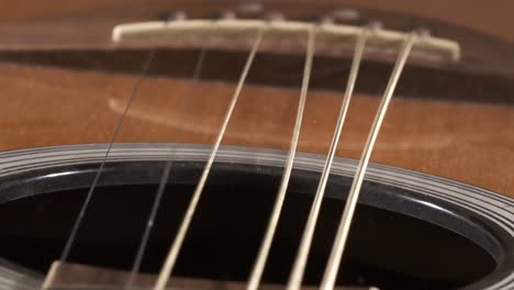 acoustic guitar strings vibrating, shot on super slow motion camera 1500 fps