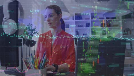 financial data processing against caucasian woman using computer at office