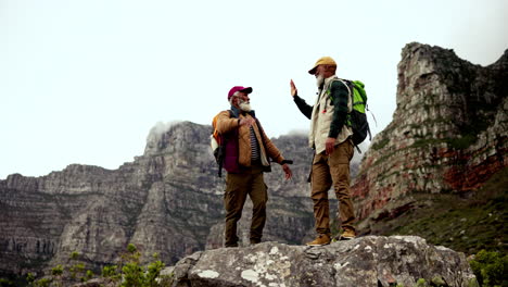senior men hiking in the mountains