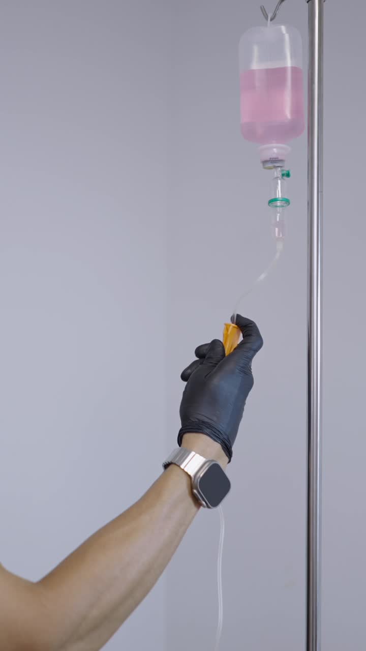 Studio portrait of a man in a black shirt