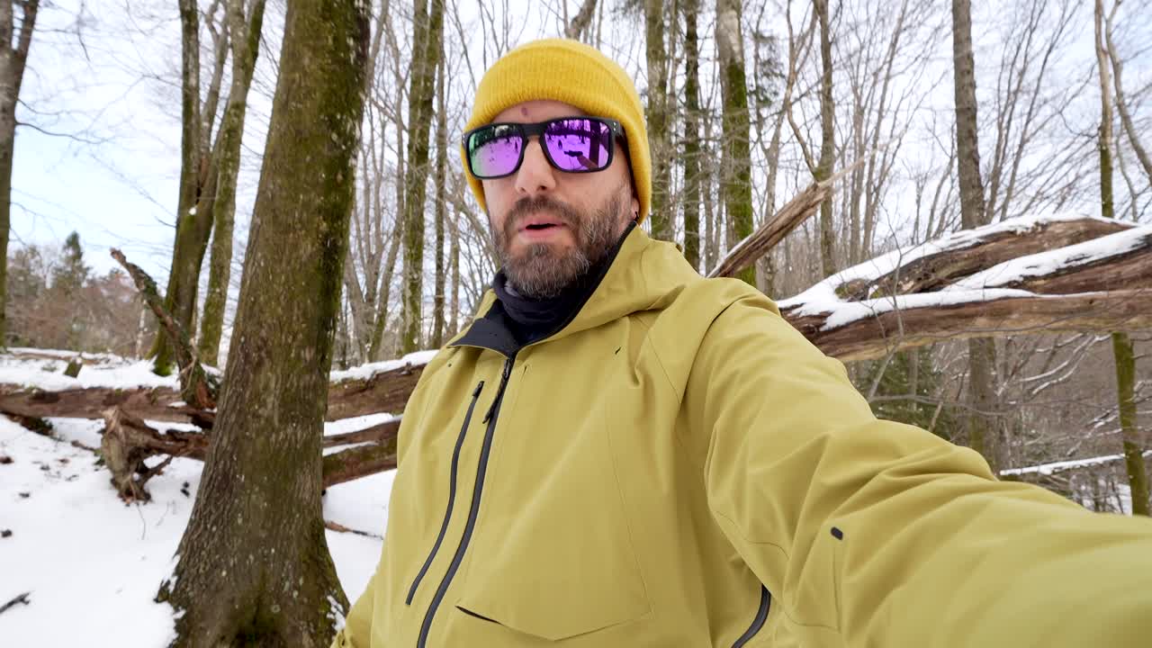 Man in winter woodland