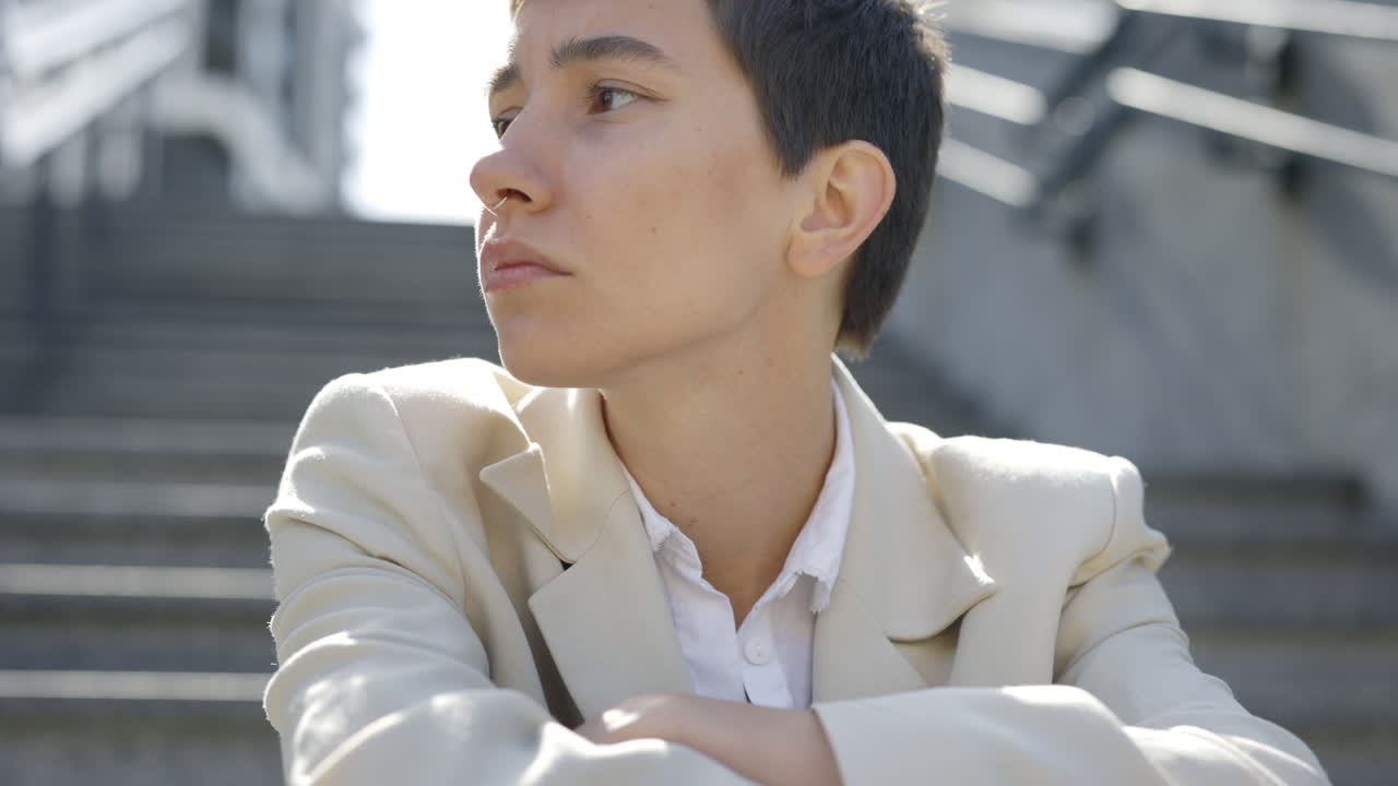 Young Person Sitting on Stairs