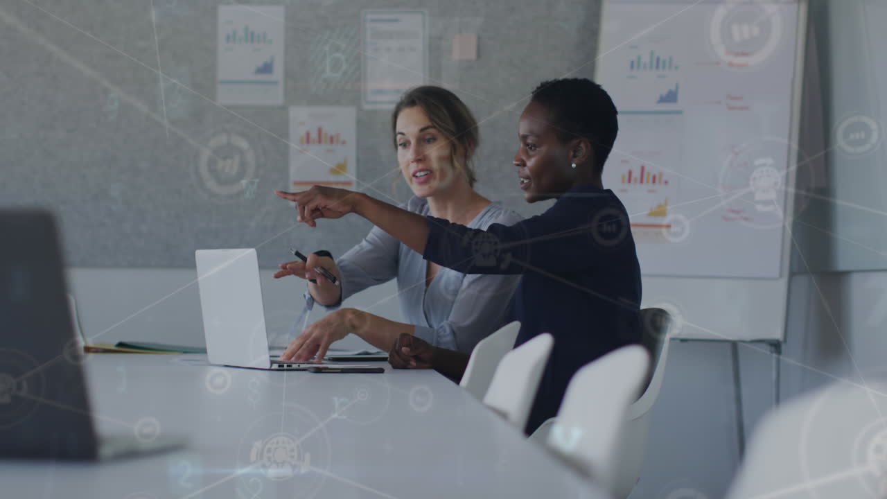 Animation of financial data processing over businesswomen in office