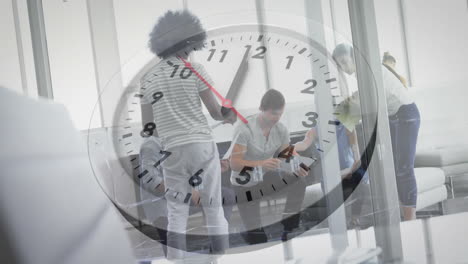 animation of clock moving over diverse colleagues discussing work