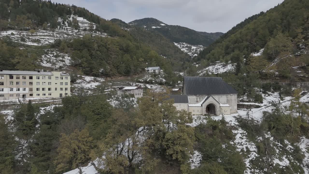 Cinematic daytime drone footage of a church in Ajaria, Georgia.