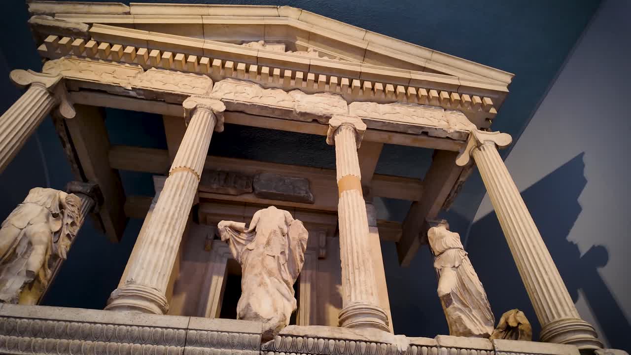 Panoramic video showcasing the intricate details of the Nereid Monument, a partial reconstruction of a Lycian tomb from ancient Xanthos dating to 380 BC