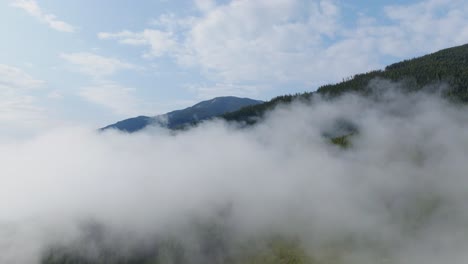 Cinematic-aerial-view-mountains-and-forest-in-Canadian-National-Park