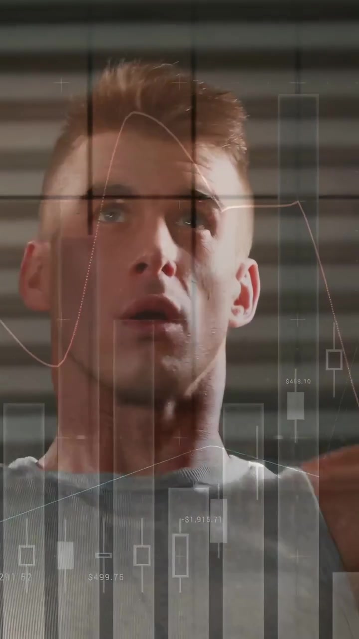 Video verticale: Focus sul busto di un uomo che alza le braccia, con grafici finanziari sovrapposti, mentre respira per le ripetizioni.