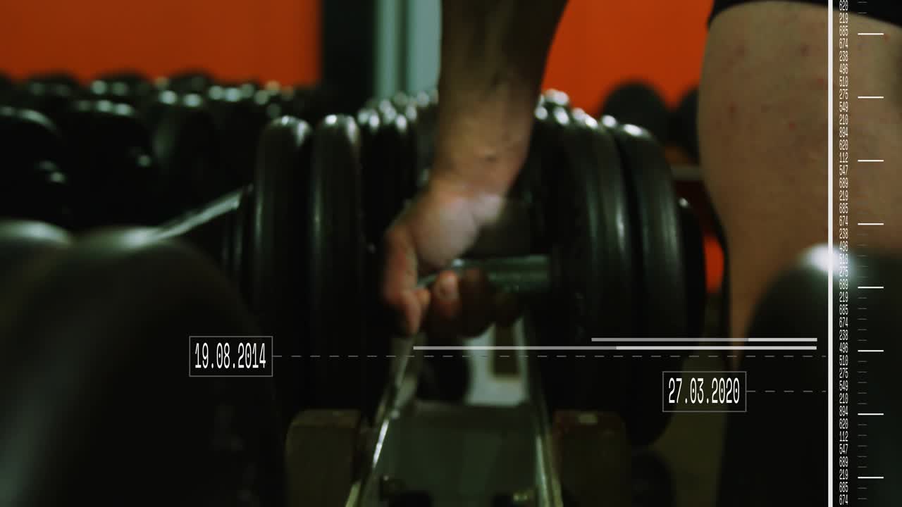 Hand entering sliding rack fingers splaying gripping weight pulling for set date labels shifting