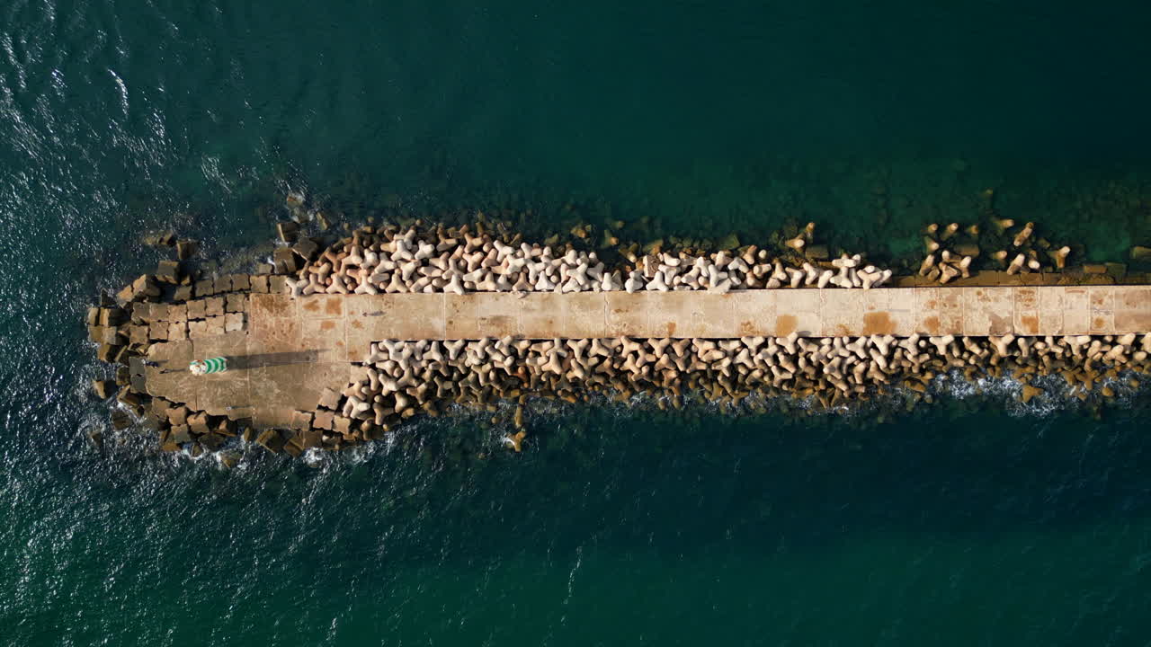 Aerial View of a Pier and Breakwater