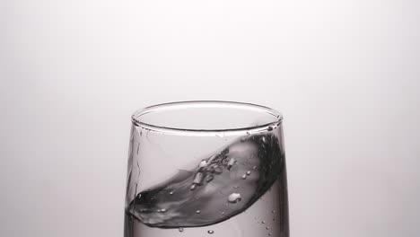 water in a glass with bubbles