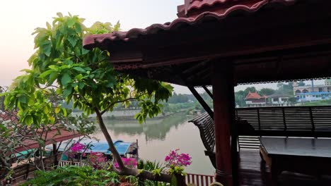 peaceful riverside view with lush greenery