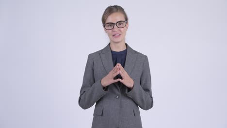 young beautiful blonde businesswoman as newscaster
