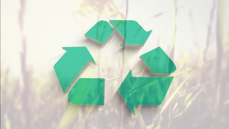 Digitale-Animation-Des-Grünen-Recyclingsymbols-Vor-Gras,-Das-Sich-Im-Wind-Im-Hintergrund-Bewegt
