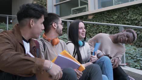 Multicultural and multigender friends talking in the university