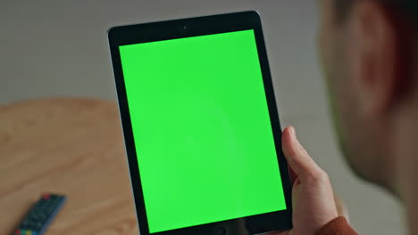 man hands swiping mockup tablet touchscreen sitting office workplace closeup