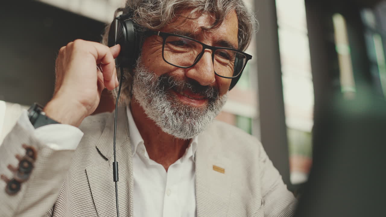 Portrait of a mature man with headphones