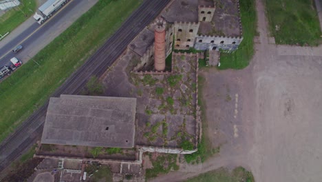 Revealing-Top-View-of-Abandoned-Factory-in-Cañuelas,-Argentina