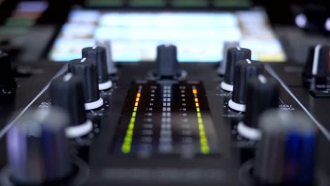 close of mixer of dj instrument playing music
