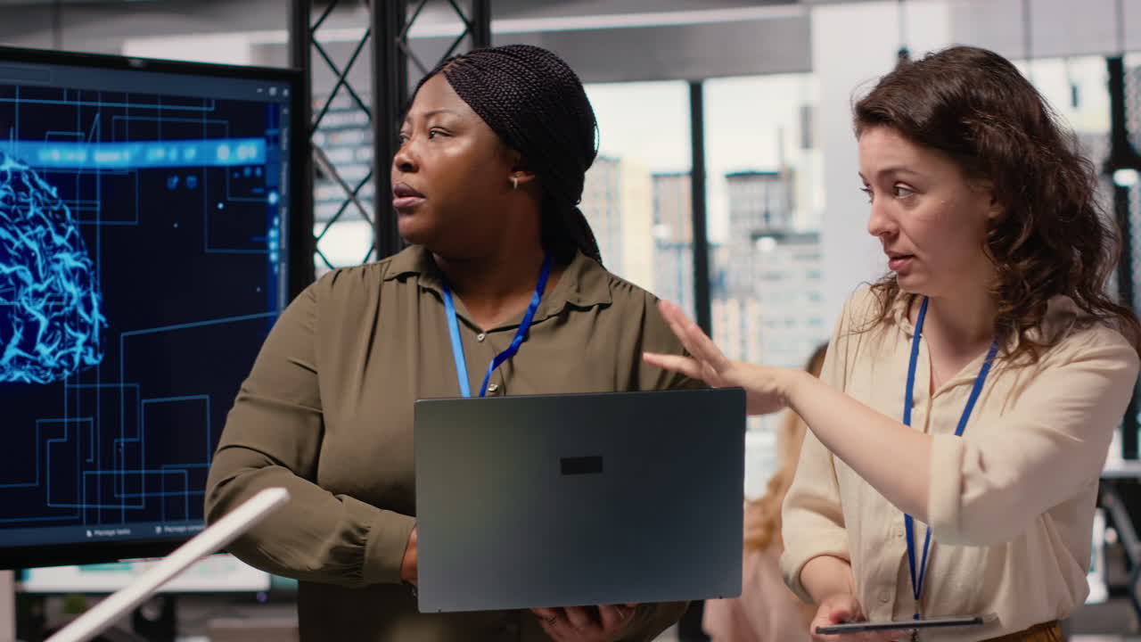 Vertical Video Diverse management staff reviewing advanced AI algorithms and predictive models