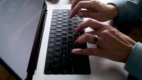 student using computer in classroom