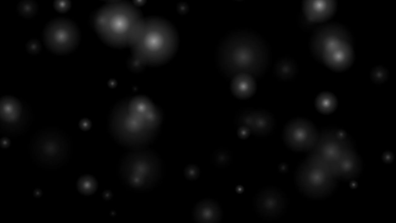 Floating White Bokeh Particles on Black Background