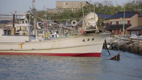 fishing boats in harbor at small town of mikuriya, tottori japan