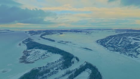 winter nature, frozen rivers in ice. winter forest in the snow, natural expanses. view from the copter, beautiful winter landscape. 4k, prores