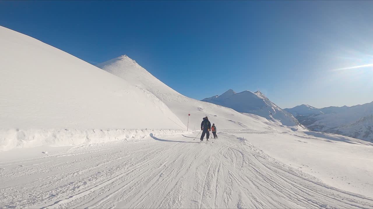Skiing in the Mountains on a Sunny Day