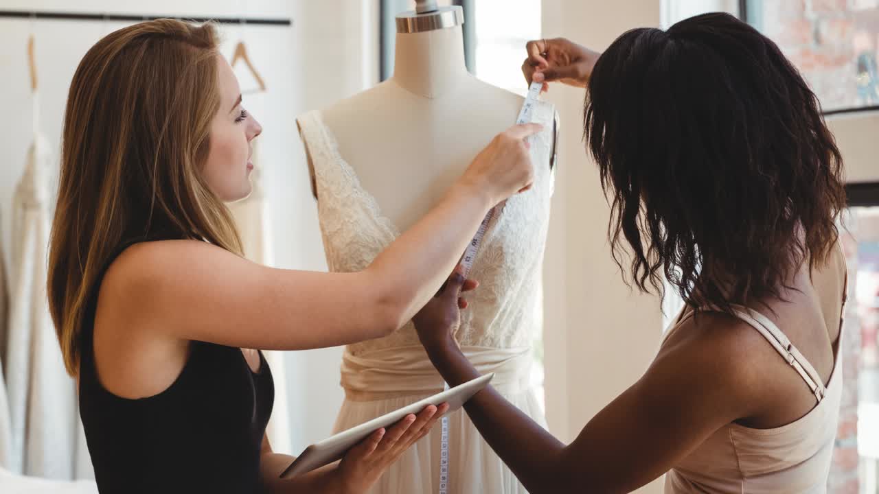 Animation of two female fashion designers working in fashion studio