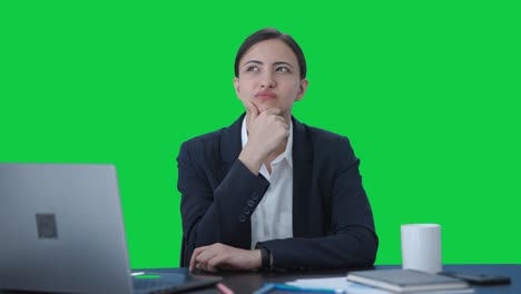 Confused-Indian-female-manager-thinking-about-something-Green-screen