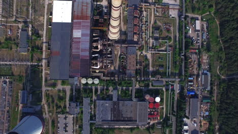 industrial area from drone above. aerial view of territory thermal power plant with industrial pipe. industrial city structure