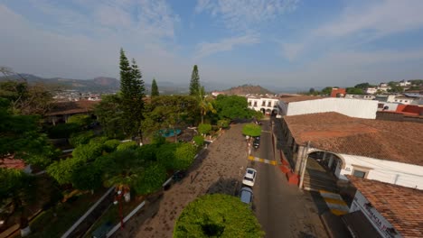fpv :drone shot of downtown tacambaro michoacan at sunrise