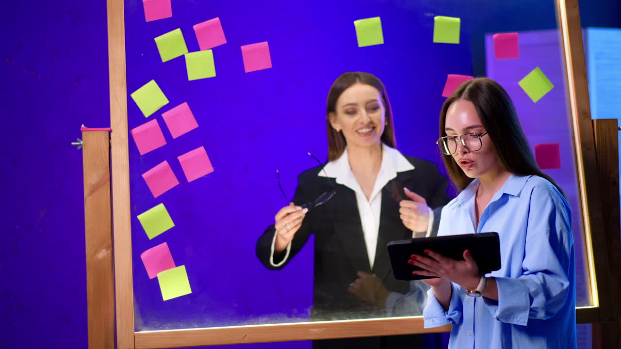 Team brainstorming session. Two professionals engage in a brainstorming session with colorful sticky notes and digital tools for idea generation