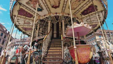 low wide angle shot of old antique carousel in strasbourg, france