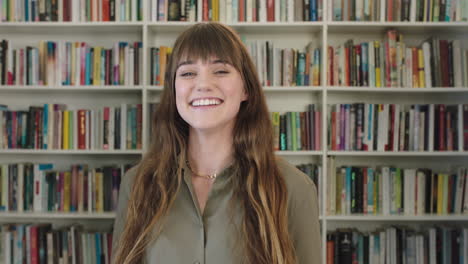 portrait of young happy caucasian woman laughing cheerful cute librarian in library bookshelf background