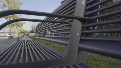 close up detail of an empty steel bench at the park in cologne, germany