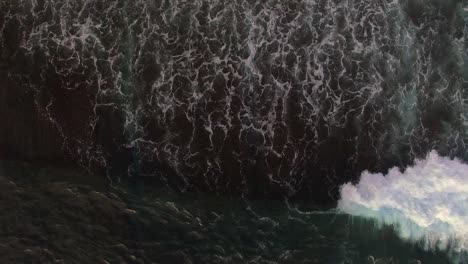 crashing waves filmed from above