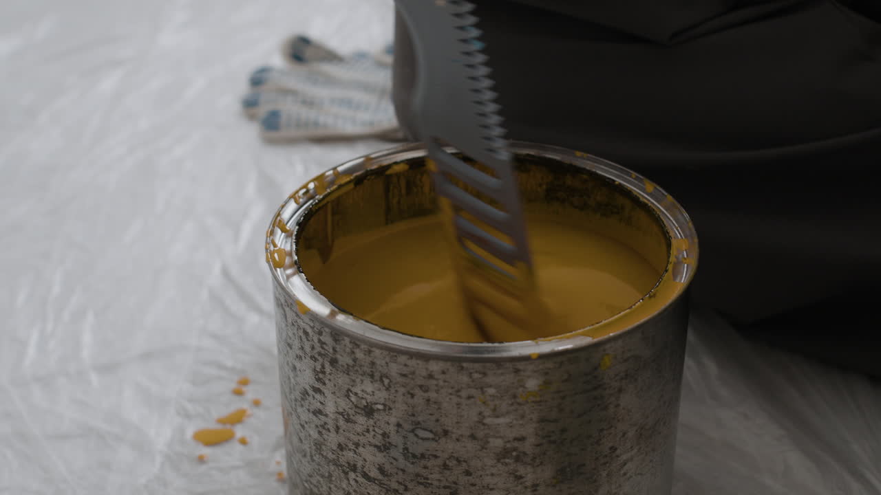 Mixing Yellow Paint for Home Improvement Project