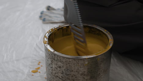 mixing yellow paint for home improvement project