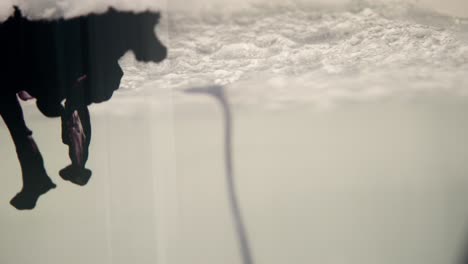 black liquid falling from foam clouds in a unique alien atmospheric landscape